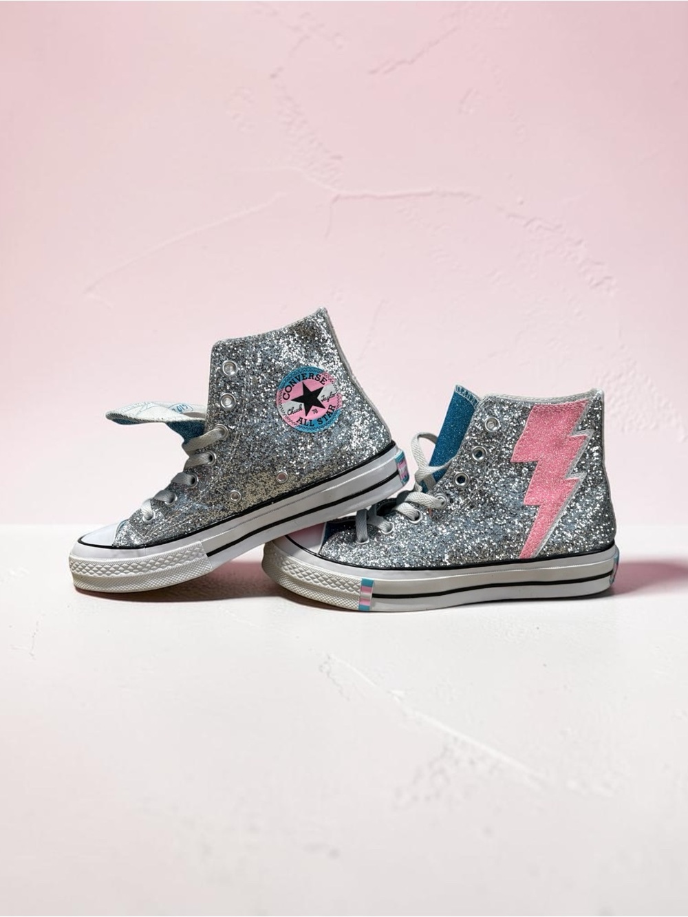 Converse Silver Glitter High-Top Sneakers with Pink Lightning